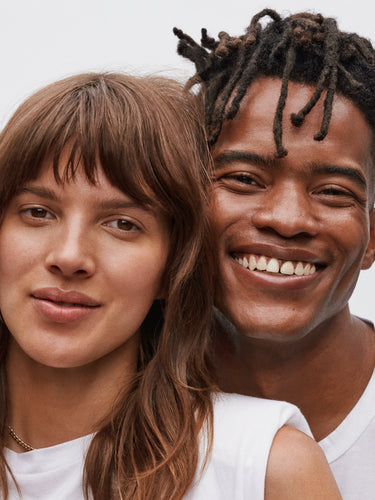 female and male model, both smiling